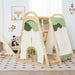 Children's play area with a wooden搭积木 toy set and plush toys on a patterned rug.