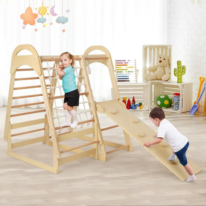 Children playing on a wooden climbing frame with slide in a room.