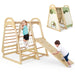 Children playing on a wooden climbing frame with slide and playhouse.