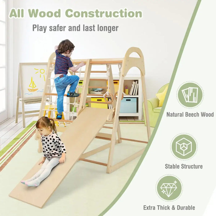 Children playing on a wooden climbing toy with slide, surrounded by books and toys.