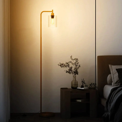 Floor lamp in a bedroom setting with a warm glow