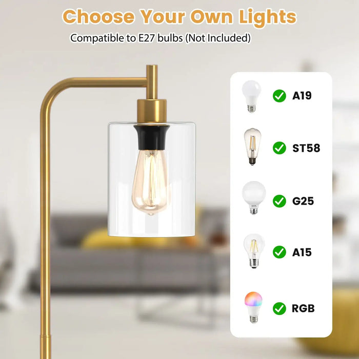 Gold floor lamp with a clear glass shade and compatibility options for E27 bulbs.