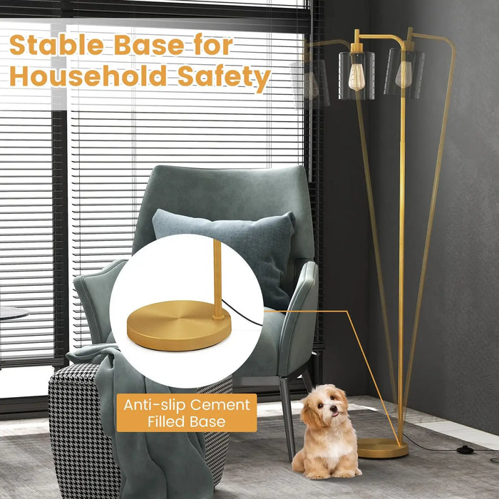 Gold floor lamp with anti-slip cement filled base in a room with a chair and dog.