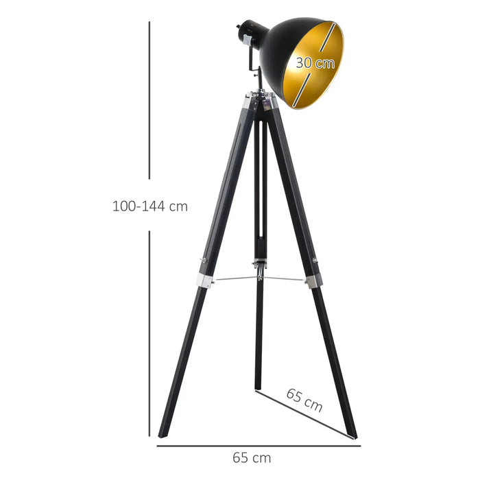 Black tripod floor lamp with gold lampshade and measurements on a white background