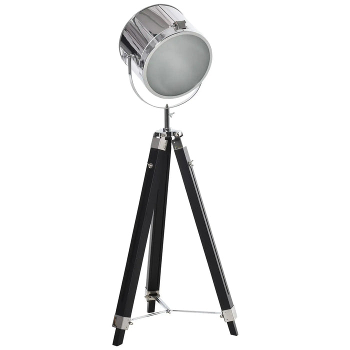 Floor lamp with a silver circular shade and black tripod base on a white background