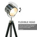 Floor lamp with flexible head on a white background