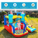 Inflatable castle slide pool trampoline and climbing wall with kids playing outdoors