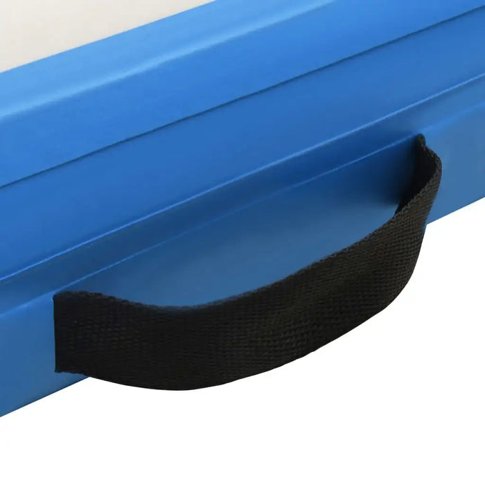 Close-up of a blue inflatable water deck platform with a black carry handle