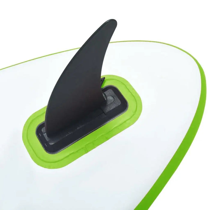 Close-up of green inflatable SUP board with black fin, PVC and EVA construction
