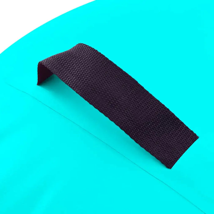 Close-up of a black woven fabric handle on a bright turquoise surface