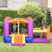 Kids playing on inflatable Outsunny water park castle with trampoline, slide, and pool in garden