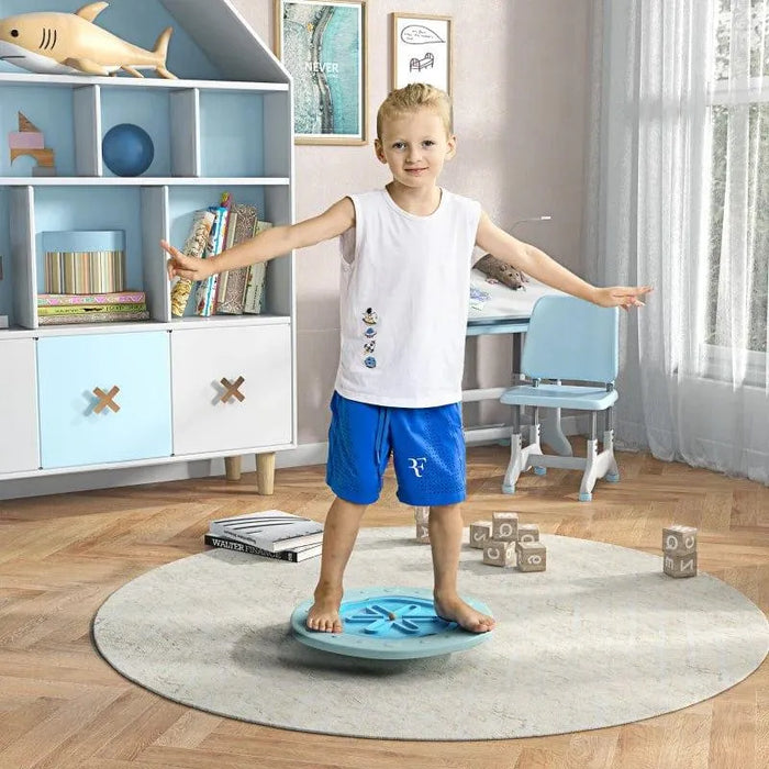 Child balancing on blue kids balance board toy in a playroom with educational blocks.