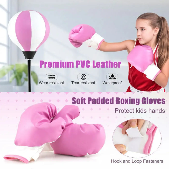 Girl in red sportswear wearing pink boxing gloves punching a pink and white punching bag
