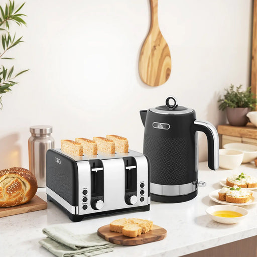 Kitchen counter with toaster, kettle, and bread on a light background