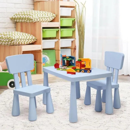Kids blue activity table and chair set with building blocks in a playroom setting