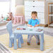 Child drawing at blue kids activity table and chair set in playroom with toys