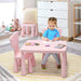 Child drawing at pink kids activity table and chair set in a cozy playroom