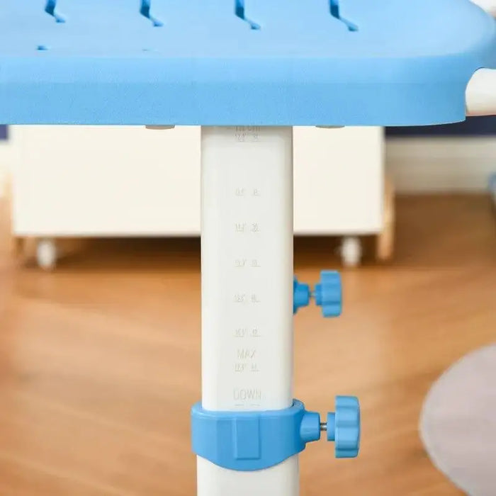 Close-up of blue adjustable kids desk height mechanism with locking knobs
