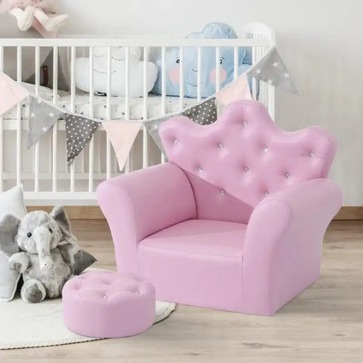 Pink kids armchair with crown backrest and crystal buttons, matching footstool in nursery