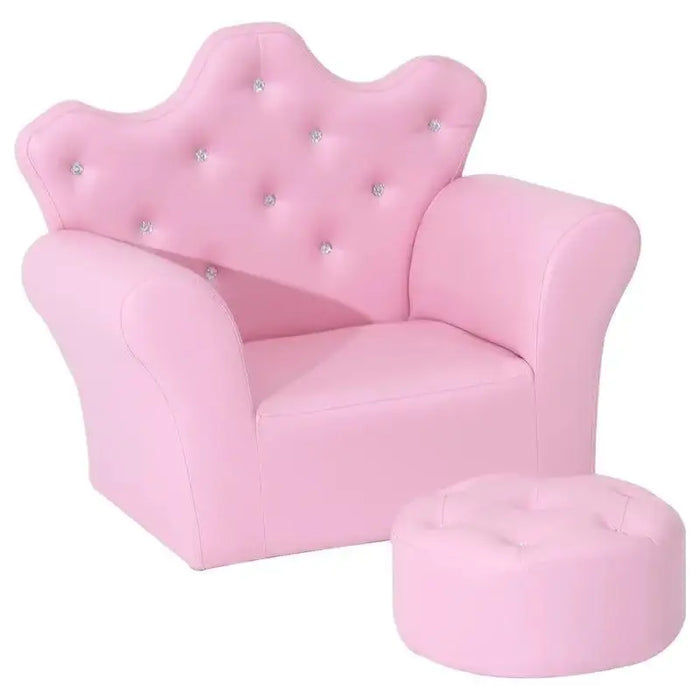 Pink kids armchair with crown-shaped backrest, crystal buttons, and matching footstool