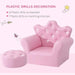 Pink kids armchair with crown backrest, crystal buttons, and matching ottoman set.