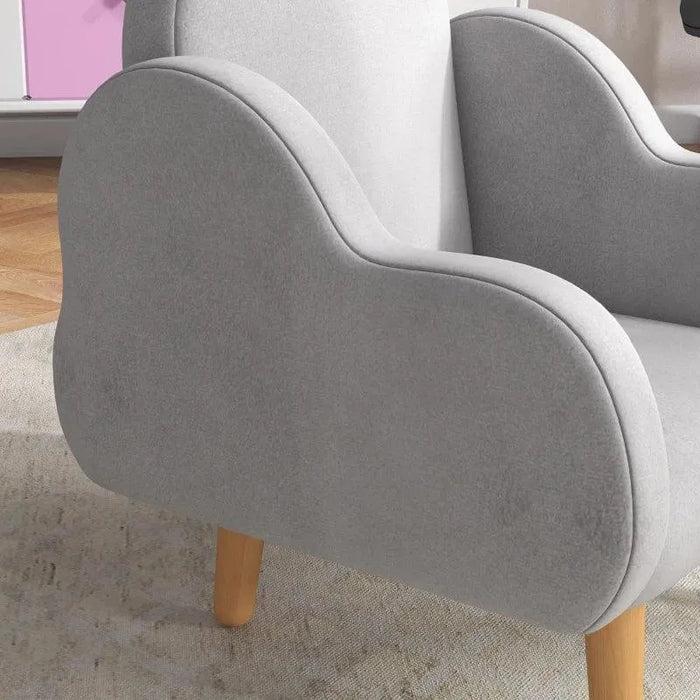 Grey Dutch velvet kids armchair with natural wood legs in cloud design on a rug