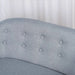 Grey kids' armchair with linen-look fabric and button-tufted backrest, close-up view