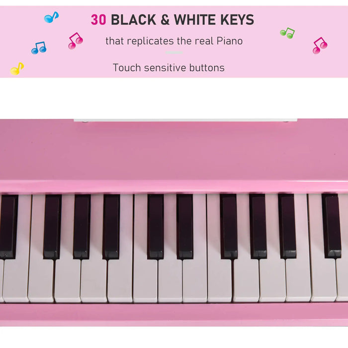 Close-up of pink kids' piano with 30 black and white touch sensitive keys