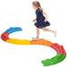 Child playing on colorful modular kids balance beam set for indoor activity