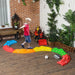 Child playing on colorful 6-piece modular kids balance beam set in outdoor patio area