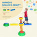 Child balancing on colorful kids' balance beams and stepping stones obstacle set