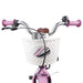 Pink kids bicycle handlebars with star grips, white basket, bell, and front reflector