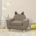 Kids chair, brown eucalyptus wood, ear-shaped backrest, in cozy playroom setting