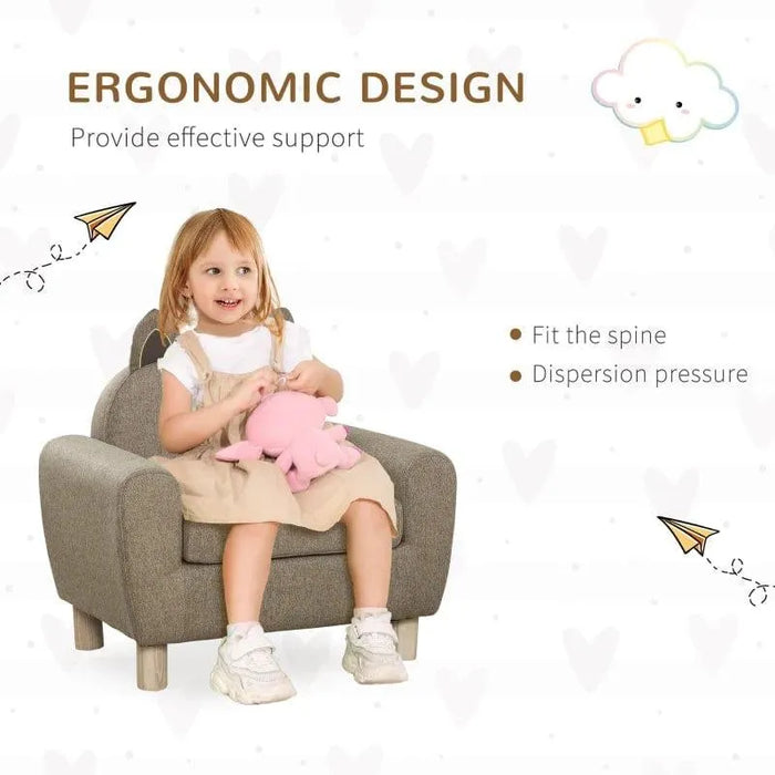 Child sitting on brown kids armchair with ear-shaped backrest, holding pink plush toy