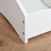 White pine wood kids' storage rack corner on wooden floor