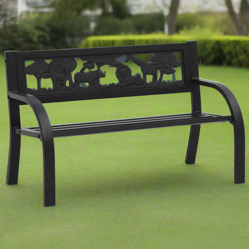 black kids decorative garden bench with animal and plant pattern on green lawn