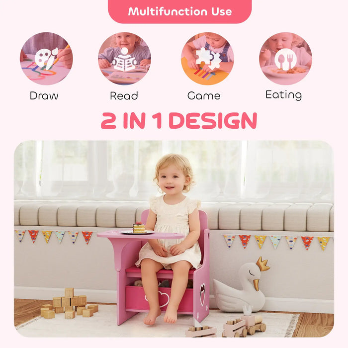 Toddler girl sitting on pink 2-in-1 kids desk and chair eating cake, with toys and decorative bunting