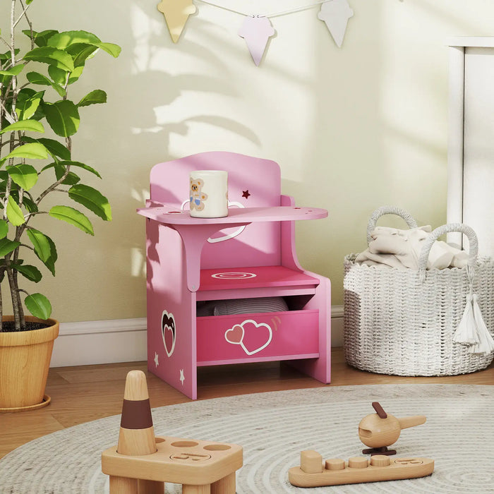 Pink kids desk and chair with built-in storage bin, decorated with hearts and stars, in cozy playroom