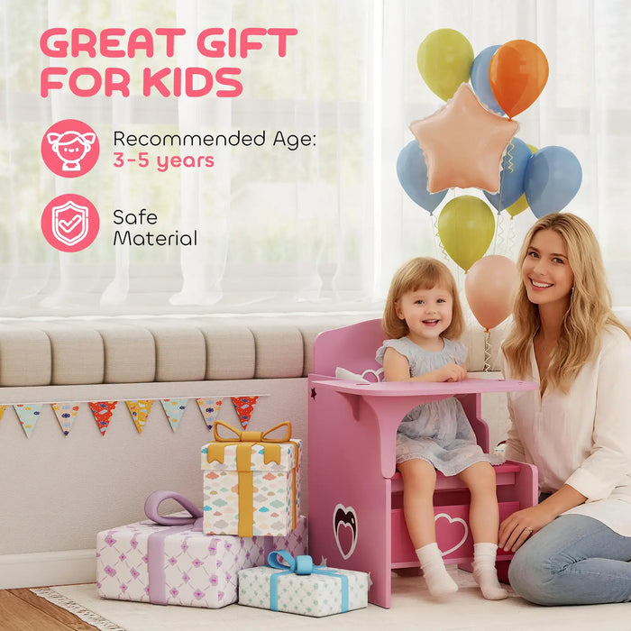 Smiling toddler sitting at pink kids desk and chair set with heart decals, balloons, gifts, and smiling woman nearby in bright room