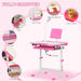 Pink kids adjustable desk and chair set with USB LED lamp, reading board, and storage features