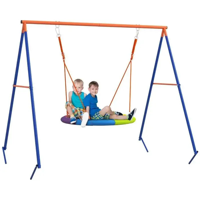 Two kids on a colorful disc swing set with blue and orange frame, white background