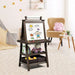 Kids double-sided easel with paper roll, magnetic whiteboard, chalkboard, and storage in a playroom