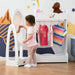 Toddler playing with white dress up set featuring 360° rotatable mirror and clothes rail