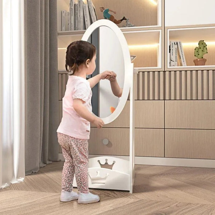 Child using white full length adjustable kids dressing mirror in modern room