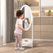 Child using white full length adjustable kids dressing mirror in modern room