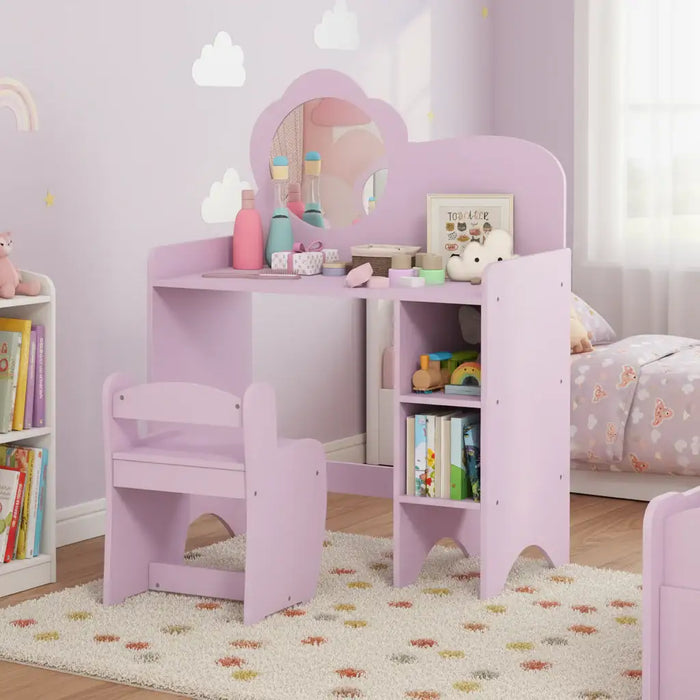 Children's vanity table with mirror, chair, and toys on a white background