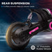 Close-up of the rear suspension and 12-inch pneumatic rubber wheels of a HOMCOM Electric Dirt Bike with Twist Grip Throttle, Music, Horn and 12" Pneumatic Tyres 24V in Pink, highlighting its smooth ride capability on uneven roads. Text on the image says, "Rear Suspension - It offers smooth rides on uneven roads" and "12’’ Pneumatic Rubber Wheels".