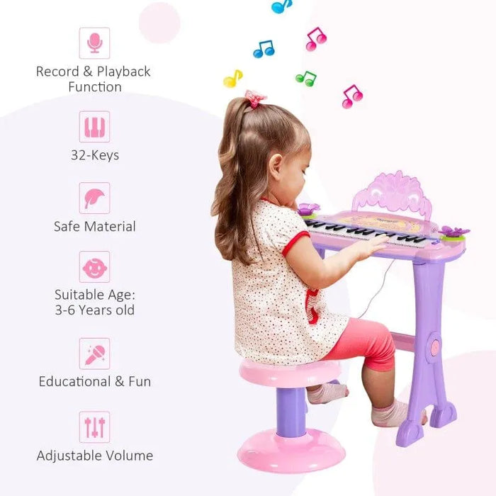 Young girl playing pink and purple kids electronic keyboard set with stool and microphone