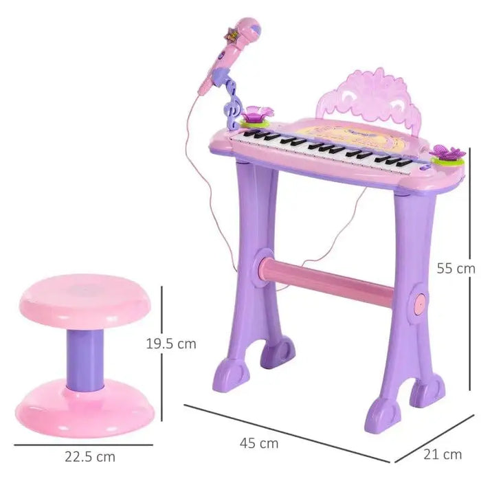 Kids pink and purple electronic keyboard with microphone, bench, and measurements shown.