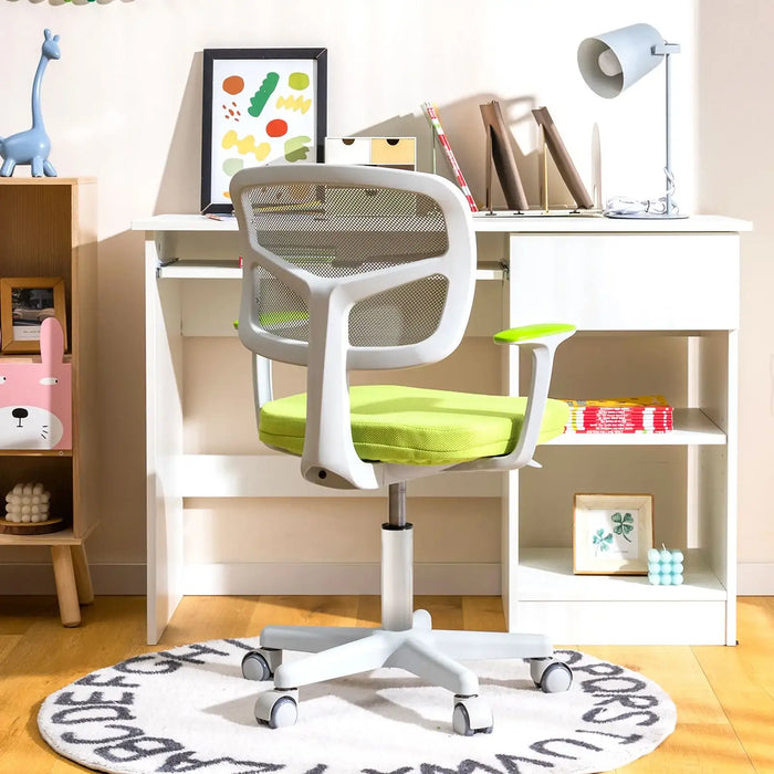 Modern white and green ergonomic office chair on alphabet rug in bright home office with white desk and decor